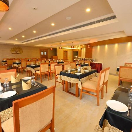 Hotel Kabani International Muvattupuzha Kültér fotó