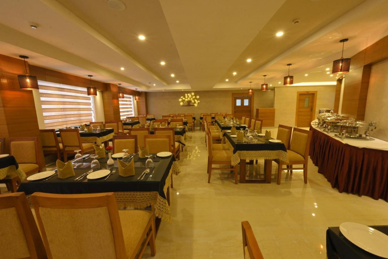 Hotel Kabani International Muvattupuzha Kültér fotó
